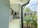 Covered front porch and entry of updated single-story home at 1 Greenfield Ct, Durham, NC 27705