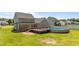 A spacious wooden deck and above ground pool for outdoor relaxation and entertainment at 112 Roping Horn Way, Willow Springs, NC 27592