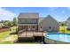 Relax in the shade on the back deck of this beautiful home at 112 Roping Horn Way, Willow Springs, NC 27592