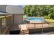 Backyard features pool with a beautiful wooden deck at 112 Roping Horn Way, Willow Springs, NC 27592