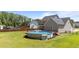 Backyard pool with deck perfect for summer fun at 112 Roping Horn Way, Willow Springs, NC 27592