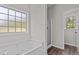 Bright bathroom featuring a soaking tub and separate glass enclosed shower at 112 Roping Horn Way, Willow Springs, NC 27592