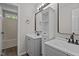Bathroom featuring a combined shower and tub, with storage space and a sink at 112 Roping Horn Way, Willow Springs, NC 27592