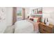A cozy bedroom features warm tones, soft bedding, and natural light at 1169 Abbott St, Mebane, NC 27302
