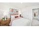 A well-lit bedroom with contemporary decor and comfortable furnishings at 1169 Abbott St, Mebane, NC 27302