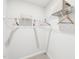 An organized closet with white wire shelving and wooden hangers at 1169 Abbott St, Mebane, NC 27302