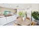 Bright and airy living space featuring a dining area, kitchen, and living room with modern decor at 1169 Abbott St, Mebane, NC 27302