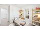 A bright home office with a contemporary desk and minimalist shelving at 1169 Abbott St, Mebane, NC 27302