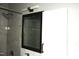 Updated bathroom with a tiled shower, modern fixtures and a mirrored vanity at 1212 St. Marys Rd, Hillsborough, NC 27278