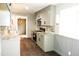 Bright kitchen showcasing white cabinets, stainless steel appliances, and granite countertops at 1212 St. Marys Rd, Hillsborough, NC 27278
