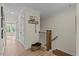 Entryway with hardwood floors, coat rack, stairs and white trim at 1255 Hammond Dr, Mebane, NC 27302