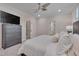 Primary bedroom with neutral walls, ensuite bathroom, and doorway to walk-in closet at 129 Cofield Cir, Durham, NC 27707