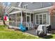 Back exterior view showing the screened in porch and patio area at 1300 Marshall Farm St, Wake Forest, NC 27587