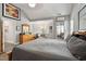 Spacious primary bedroom with a vaulted ceiling, wood floors, and a seating area at 1300 Marshall Farm St, Wake Forest, NC 27587