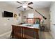 Bedroom features a queen bed, ceiling fan, and a window creating a cozy and inviting atmosphere at 1300 Marshall Farm St, Wake Forest, NC 27587