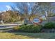 Community entrance sign amidst lush landscaping at Heritage Wake Forest at 1300 Marshall Farm St, Wake Forest, NC 27587