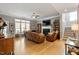 Spacious living room boasts hardwood floors, fireplace, and stairway, perfect for relaxing and entertaining at 1300 Marshall Farm St, Wake Forest, NC 27587