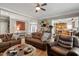 Inviting living room features hardwood floors and comfortable seating, ideal for gatherings and relaxation at 1300 Marshall Farm St, Wake Forest, NC 27587