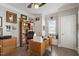 Charming home office features built-in shelves, natural light, and hardwood floors at 1300 Marshall Farm St, Wake Forest, NC 27587