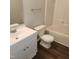 Bathroom featuring a white vanity, toilet and shower/tub combo at 132 Waiters Way Way, Youngsville, NC 27596