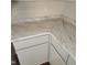 This kitchen counter has white cabinets and a marbled countertop at 132 Waiters Way Way, Youngsville, NC 27596