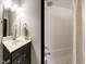 Cozy bathroom featuring white subway tile and a shower/tub combo at 136 Glenpark Pl, Cary, NC 27511