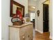 Entryway featuring antique decorations, hardwood flooring, and neutral wall colors at 136 Glenpark Pl, Cary, NC 27511