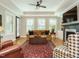Bright living room features a fireplace, recessed lighting, and stylish furniture at 136 Glenpark Pl, Cary, NC 27511