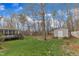 Large backyard featuring a screened porch and storage shed, great for outdoor living at 1410 Briardale Ln, Durham, NC 27712