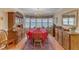 Charming dining room featuring natural light and wooden furnishings at 1410 Briardale Ln, Durham, NC 27712