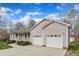 Lovely home with a two-car garage and a spacious driveway, perfect for additional parking at 1410 Briardale Ln, Durham, NC 27712