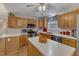 This eat-in kitchen has wood cabinets, a window over the sink, and a convenient island at 1410 Briardale Ln, Durham, NC 27712