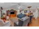 Bright living room with hardwood floors, vaulted ceilings, and ample seating at 1410 Briardale Ln, Durham, NC 27712