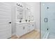 Bathroom featuring double vanity, granite countertops, and a glass shower at 1429 Sagamore Dr, Louisburg, NC 27549