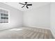 Bright bedroom with carpet flooring and natural light at 1429 Sagamore Dr, Louisburg, NC 27549