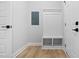 Entryway with built-in bench and storage, and neutral colored walls at 1429 Sagamore Dr, Louisburg, NC 27549