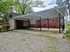 View of a carport attached to the house, offering convenient covered parking at 1522 W Thomas St, Rocky Mount, NC 27804