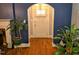 Entryway with hardwood floors, an arched doorway, and freshly painted walls at 1522 W Thomas St, Rocky Mount, NC 27804