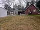 View of house with backyard, garage, and ample space at 1522 W Thomas St, Rocky Mount, NC 27804