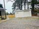Exterior of a white, detached garage on a gravel driveway at 1522 W Thomas St, Rocky Mount, NC 27804