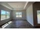 Dining room with a trey ceiling, wood floors and natural light at 1579 Pecan Drive # 29, Nashville, NC 27856