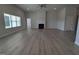 Large, open living room with plenty of space and natural light features a fireplace at 1579 Pecan Drive # 29, Nashville, NC 27856
