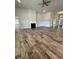 Open floorplan shows a spacious living room with a fireplace and views into other rooms at 1579 Pecan Drive # 29, Nashville, NC 27856