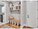 Mudroom with bench seating, storage cubbies, and hooks at 1801 Clifton Pines Dr, Cary, NC 27519