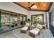 Relaxing outdoor patio with a ceiling fan, and comfortable seating area with neighborhood views at 1801 Clifton Pines Dr, Cary, NC 27519