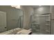 Modern bathroom features a glass enclosed shower and quartz vanity at 20 Bold Dr, Youngsville, NC 27596
