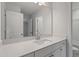 Bathroom with a white vanity, white basin, and large mirror at 20 Bold Dr, Youngsville, NC 27596