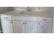 Bathroom vanity with white cabinets, a modern sink, and chrome hardware at 20 Bold Dr, Youngsville, NC 27596