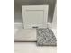 Showcasing design options with cabinet door, granite, and tile samples at 20 Bold Dr, Youngsville, NC 27596
