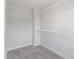 Empty walk-in closet featuring wire shelving and gray carpeted floors at 20 Bold Dr, Youngsville, NC 27596